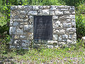 Plaque near entrance of Pittman Work Center. It reads: Memorial Plantation Dedicated to William H. Croke First Ranger of the Seminole Ranger District who died March 27, 1958 Bill loved the Ocala The Ocala loved Bill Ocala National Forest Forest Service U. S. Dept. of Agriculture