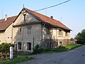 Čeština: Zástavba v Podvlčí. English: Houses in Podvlčí.