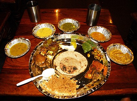 A vegetarian thali from Rajasthan, India. Since many Indian religions promote vegetarianism, Indian cuisine offers a wide variety of vegetarian delicacies.