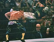 Rey Mysterio's 619 (tiger feint kick) on Eddie Guerrero Rey619.jpg