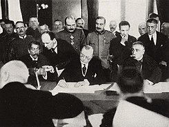 RomanianPMMarghilomanSigningBukarestPeaceTreaty1918.jpeg