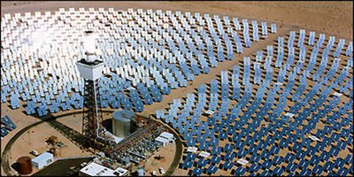 The Solar Two solar-thermal power project near Daggett, California. Every mirror in the field of heliostats reflects sunlight continuously onto the re