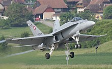 An F/A-18C taking off from Payerne air base Swiss F A-18 Hornet taking off from Payerne (cropped).jpg