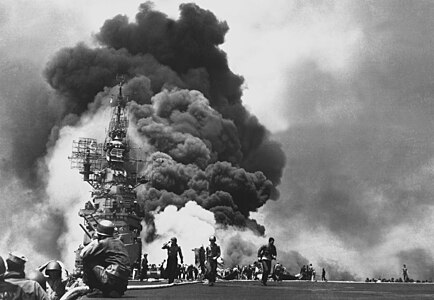 The USS Bunker Hill hit by kamikazes during the Battle of Okinawa