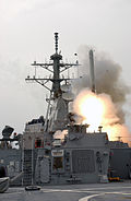 US Navy 030322-N-1035L-006 The guided missile destroyer USS Milius (DDG 69) launches a Tomahawk Land Attack Missile (TLAM) toward Iraq