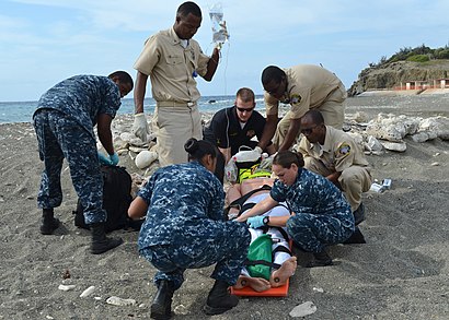 US Navy 120203-N-CD652-004 U.S. Naval Hospital Guantanamo Bay emergency technician (EMT) trainees work with Naval Station Guantanamo Bay firemen to.jpg