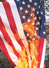 U.S. flag being burned in protest on the eve of the 2008 election US flag burning.jpg