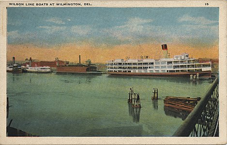Postcard depicting Wilson Line boats on the Christina River. The State of Pennsylvania or her identical sister ship State of Delaware on the right