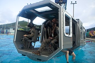 Soldiers training for a worst-case scenario prepare for a simulated underwater helicopter crash. Worst Case Scenario 131210-M-QH615-002.jpg