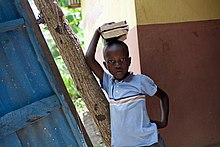 Over 90% of students in Port-au-Prince had their schools destroyed in the earthquake. (2011 Education for All Global Monitoring Report) - Rebuilding schools after the 2010 earthquake, Port au Prince, Haiti.jpg