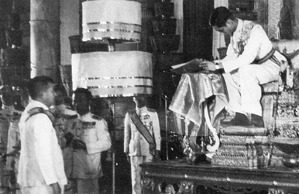 King Ananda Mahidol (Rama VIII) signs The 1946 Constitution of the Kingdom of Siam on 9 May 1946.