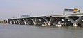 As supports for the Woodrow Wilson Bridge carrying Interstate 95 (I-95) and the Capital Beltway over the Potomac River between Alexandria, Virginia and Oxon Hill, Maryland, U.S.A. (2007)