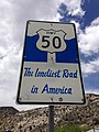 2014-05-21 12 23 20 Sign for the Loneliest Road in America along U.S. Route 50 westbound just west of downtown Ely, Nevada.JPG