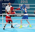 Hichem Maouche (Algeria; left) vs. Dean Clancy (Ireland) in the Preliminary Round 1 match