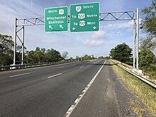 View south at the north end of SR 37 at US 11 north of Winchester 2019-08-02 08 29 38 View south along U.S. Route 11 (Martinsburg Pike) at the exit for Virginia State Route 37 SOUTH (TO U.S. Route 522 NORTH, TO U.S. Route 50 WEST) in Sunnyside, Frederick County, Virginia.jpg