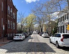 P Street NW, in Georgetown, features streetcar tracks installed by the Metropolitan Railroad in the 1890s. 3200 block P Street NW.jpg