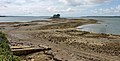 L'îlot situé à l'extrémité de la Pointe du Château vu de cette dernière à marée basse 1.