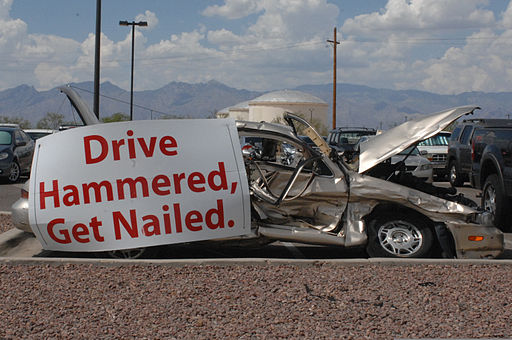 A car sits in the 755th Aircraft Maintenance Squadron's parking lot July 15, 2013, at Davis-Monthan Air Force Base, Ariz., to represent an accident resulting from drunk driving 130715-F-WQ860-006