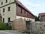 Haus Altbirkwitz 11 in Birkwitz, Pirna (denkmalgeschützte Stütz- und Böschungsmauern aus Sandstein mit Treppen)