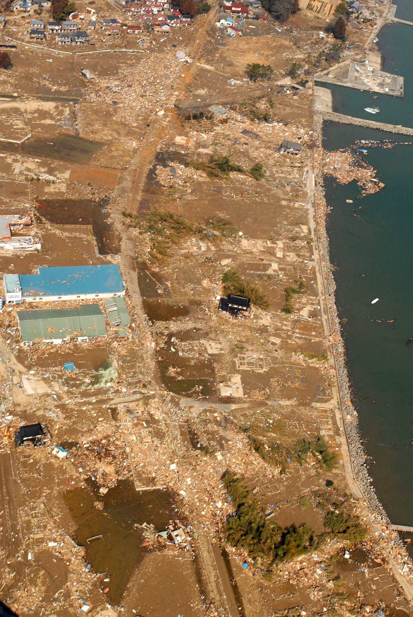 File An Aerial View Of Tsunami Damage In An Area North Of Sendai Japan Taken From A U S Navy Helicopter Jpg Wikipedia