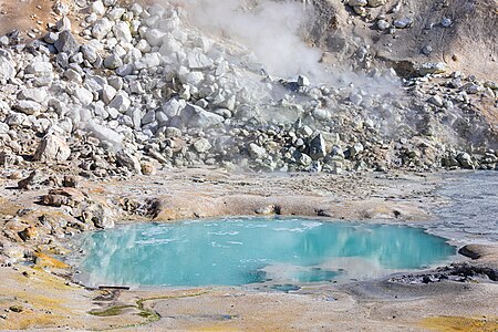 An aquamarine-colored water pool in the Bumpass Hell hydrothermal area, Lassen Volcanic National Park