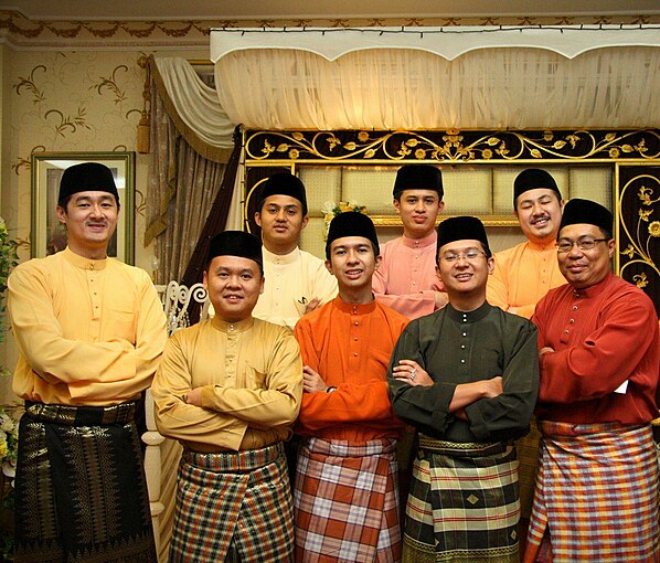 Men wearing songkok as part of Baju Melayu traditional Malay men attire