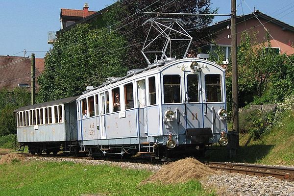 Electric railcar BCFe 4/4 11 and passenger car BC4 22 of the Montreux–Lenk im Simmental line