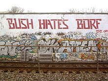"Bush hates Borf" message painted on the Vision Lighting building near the Takoma Metro station. This message was changed to "Obama Hates Borf" in 2009. Bush hates Borf.jpg