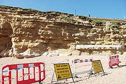 Burton Beach, Burton Bradstock, Dorset, the scene of a fatal landslide on 24 July 2012. Cliffs on Burton Beach.jpg