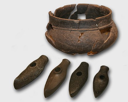 Corded Ware culture pottery and stone axes at the Estonian History Museum.