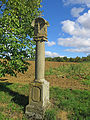 Column shrine on a mirrored base