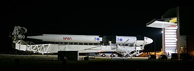 Falcon 9 B1058.1, with Crew Dragon Endeavour, being rolled out from the SpaceX Horizontal Integration Facility.