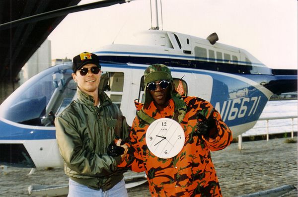 Flavor Flav and helicopter pilot Ray McCort on an MTV shoot in New York City