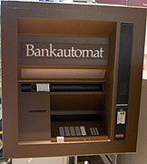 Guichet automate de banque, après 1970.