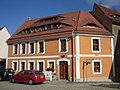 Gasthof „Schwarzer Kater“ in geschlossener Bebauung