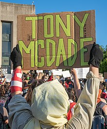 A protester in New York City holds a sign commemorating McDade George Floyd rally in Grand Army Plaza (02839).jpg