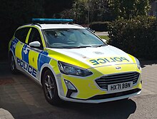 Ford Focus Active displaying the battenberg markings in 2022. Hampshire Constabulary Ford Focus MkIV Active in Leigh Park, Havant.jpg