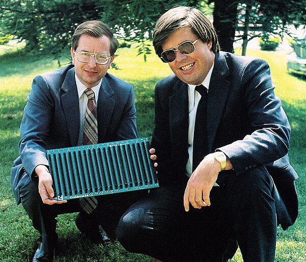 Harry Garland and Roger Melen, co-founders of Cromemco, holding an S-100 backplane (1981)