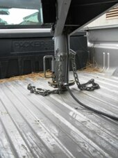 Heavy trailer mounted on a gooseneck hitch inside pickup truck bed Horse trailer hitch (5909828571).jpg