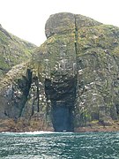 Huge cave and cliffs with nesting seabirds on west side of Mingulay - geograph.org.uk - 851249.jpg