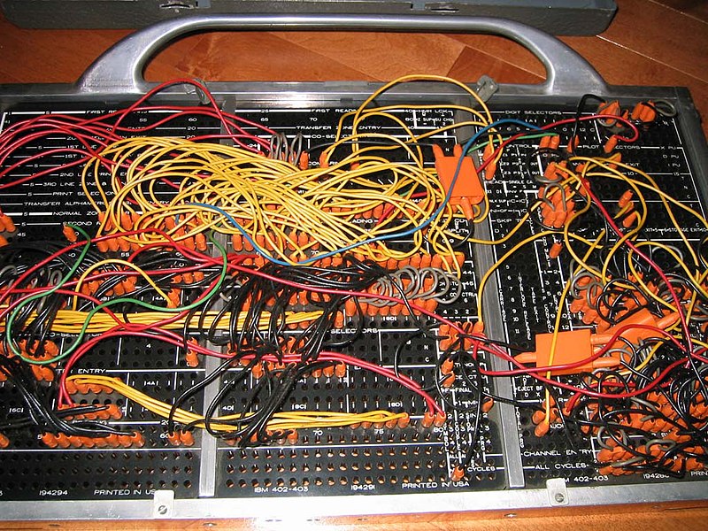 https://upload.wikimedia.org/wikipedia/commons/thumb/b/b7/IBM402plugboard.Shrigley.wireside.jpg/800px-IBM402plugboard.Shrigley.wireside.jpg