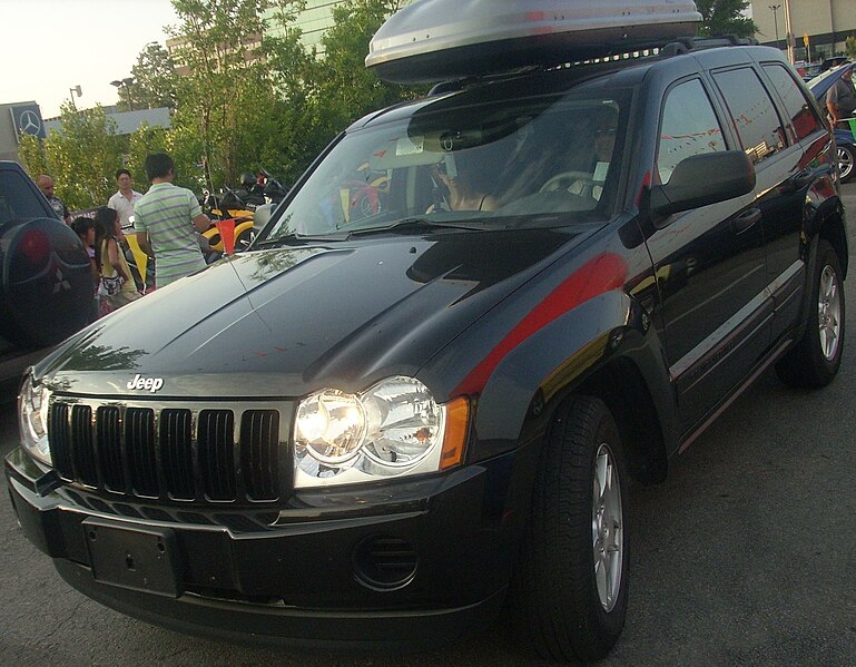 File:Jeep WK Grand Cherokee (Orange Julep '10).jpg