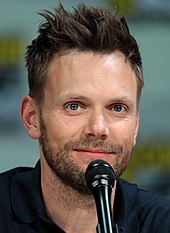 Joel McHale (pictured in 2014) was cast as a guest star after his roast of Barack Obama at the 2014 White House Correspondents Dinner. Joel McHale 2014 Comic Con (cropped).jpg