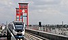 The LRT Palembang crossing the famous Ampera Bridge