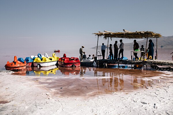 On holidays people come to see Lake Urmia around the "Shahid Kalantari" highway that still has water. The 15 km highway was constructed by drying 85% 