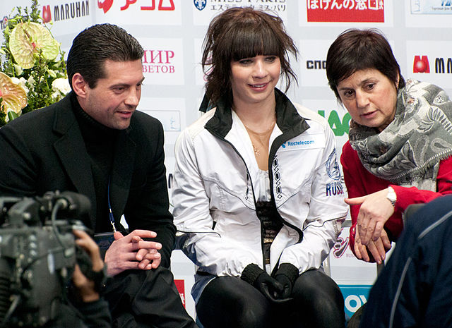 Leonova with her coaches Nikolai Morozov (left) and Alla Piatova (right)