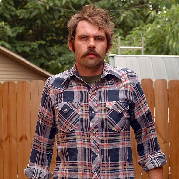 File:Man in plaid shirt.jpg