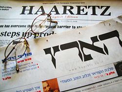 Front page of the Hebrew and English editions of Haaretz. Newspapers.jpg