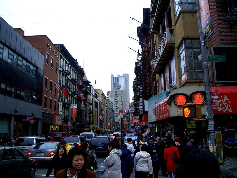 Selling imitation luxury goods on Canal Street, New York City, 2022