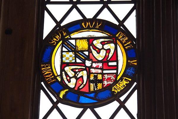 Arms of Stanley, with quarterings of Strange, King of Man, Woodville, Mohun, and de Warenne (Earl of Surrey), all circumscribed by the Garter. Possibl